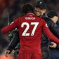 Liverpool manager Jurgen Klopp embraces foward Divock Origi after his late winner against Everton
