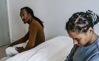 Couple having a conflict in the bedroom
