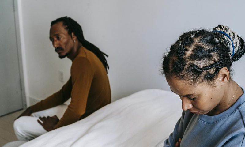 Couple having a conflict in the bedroom