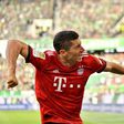 Bayern Munich striker Robert Lewandowski celebrates scoring the first of his two goals