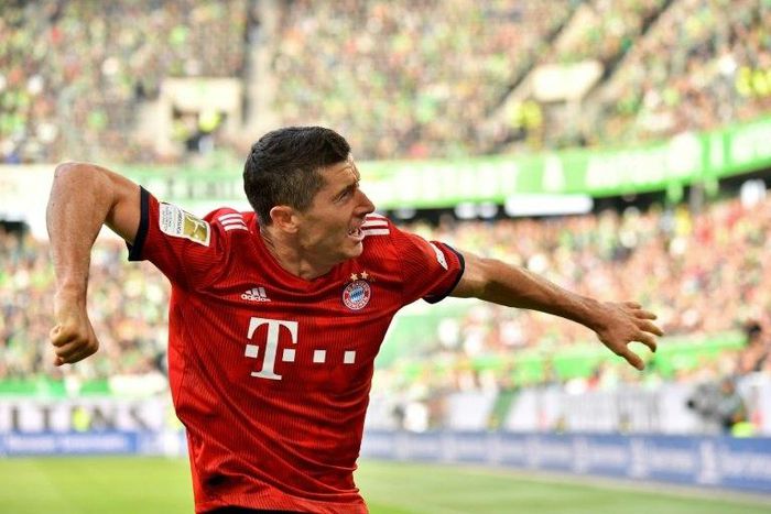 Bayern Munich striker Robert Lewandowski celebrates scoring the first of his two goals