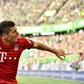 Bayern Munich striker Robert Lewandowski celebrates scoring the first of his two goals