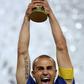 Italy captain Fabio Cannavaro lifts the World Cup trophy at Berlin?s Olympic Stadium after winning the 2006 finals, which is nicknamed 'the summer fairytale' in Germany.