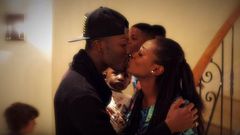 Reggie Zippy kisses wife