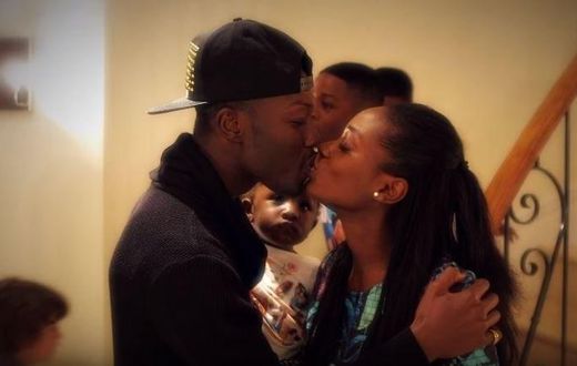 Reggie Zippy kisses wife
