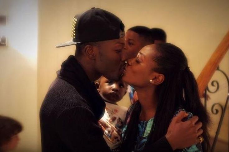 Reggie Zippy kisses wife