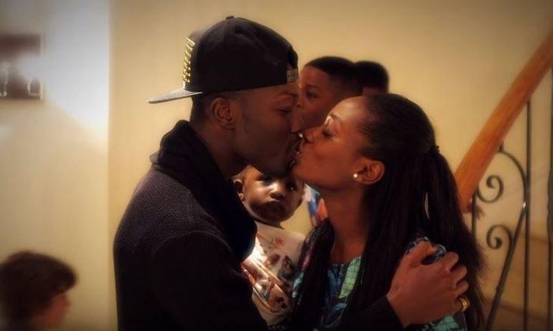Reggie Zippy kisses wife
