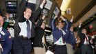 traders celebrating soccer world cup