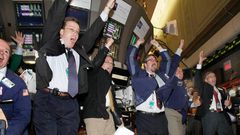 traders celebrating soccer world cup