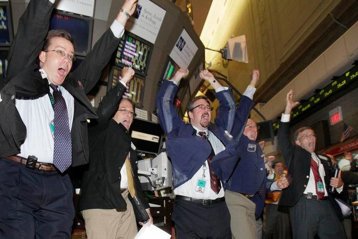 traders celebrating soccer world cup