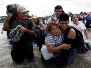 Powerful photos and stories from the caravan show migrants' harrowing journey to the US