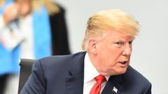 BUENOS AIRES, ARGENTINA - NOVEMBER 30: U.S. President Donald Trump gestures during the plenary session on the opening day of Argentina G20 Leaders' Summit 2018 at Costa Salguero on November 30, 2018 in Buenos Aires, Argentina. (Photo by Amilcar Orfali/...