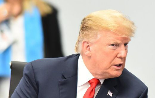 BUENOS AIRES, ARGENTINA - NOVEMBER 30: U.S. President Donald Trump gestures during the plenary session on the opening day of Argentina G20 Leaders' Summit 2018 at Costa Salguero on November 30, 2018 in Buenos Aires, Argentina. (Photo by Amilcar Orfali/...