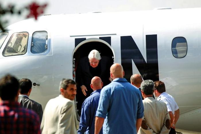 Martin Griffiths (C), the UN special envoy for Yemen, arrives at Sanaa international airport on November 21, 2018