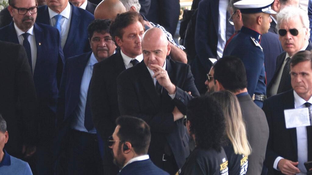 Gianni Infantino was present at Pele's wake at the Vila Belmiro stadium on Monday