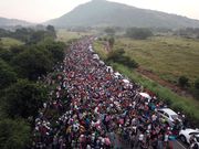 Powerful photos and stories from the caravan show migrants' harrowing journey to the US