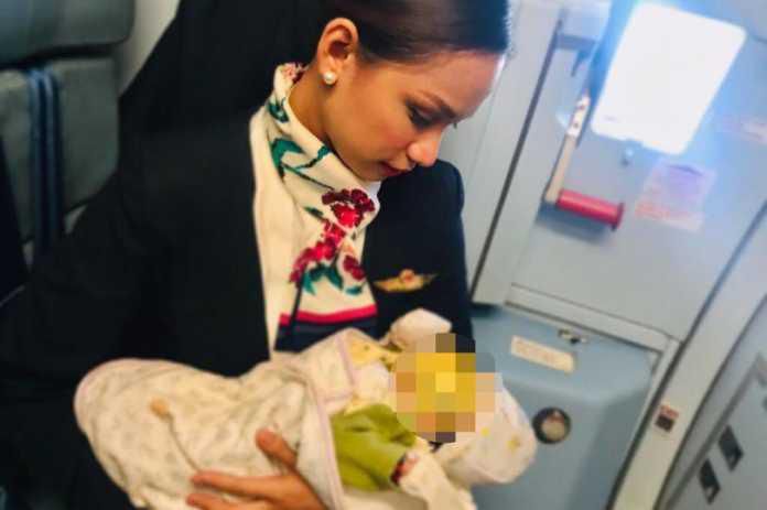 Air hostess breastfeeds a passenger’s crying baby