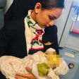 Air hostess breastfeeds a passenger’s crying baby