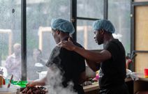 Hilda's sous chef offering her support [Hilda Baci's Cook-a-thon]