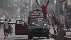 Violence rocked the streets of Haiti's Capital Port-Au-Prince with armed gangs taking on the police