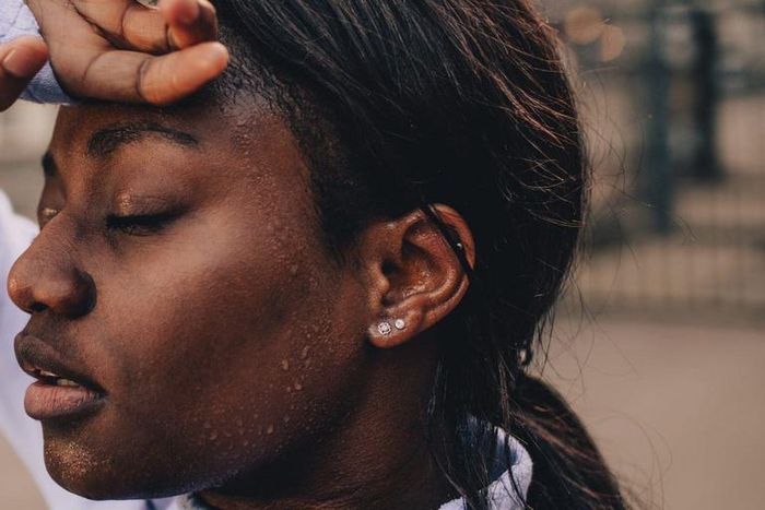 Sweating a lot while working out can be attributed to wearing too tight of clothes, eating a big meal before being active, physiological factors, or the medical issue hyperhidrosis.AleksandarNakic/Getty Images