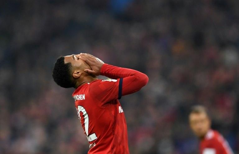 Goal-scorer Serge Gnabry holds his head in his hands as Bayern Munich waste another opportunity in Saturday's 1-1 draw at home to Freiburg, which left them four points behind in the table.