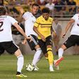 Borussia Dortmund's Jadon Sancho (C) is a weapon off the bench, according to club captain Marco Reus, after the England junior international shone in Wednesday's 7-0 hammering of Nuremberg.