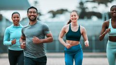 Stock photo: A group-of-young-people-running-together