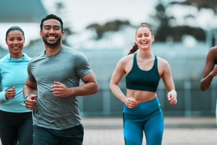 Stock photo: A group-of-young-people-running-together