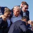 Donald Trump gets helped off the stage by aides in Pennsylvania on July 13 after an assassination attempt.Anna Moneymaker/Getty Images