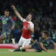 Arsenal qualified despite a goalless draw at home with Sporting