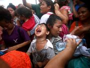 Powerful photos and stories from the caravan show migrants' harrowing journey to the US
