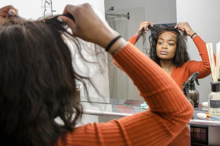 Here's why Nigerian women need to press pause on human hair wigs [istockphoto]