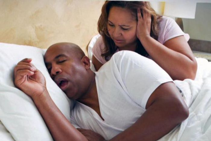 Snoring man disturibing