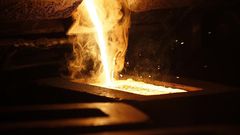 Liquid gold is poured to form gold dore bars at Newmont Mining's Carlin gold mine operation near Elko.