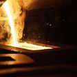 Liquid gold is poured to form gold dore bars at Newmont Mining's Carlin gold mine operation near Elko.