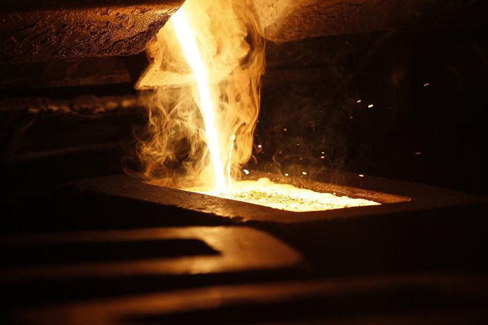 Liquid gold is poured to form gold dore bars at Newmont Mining's Carlin gold mine operation near Elko.