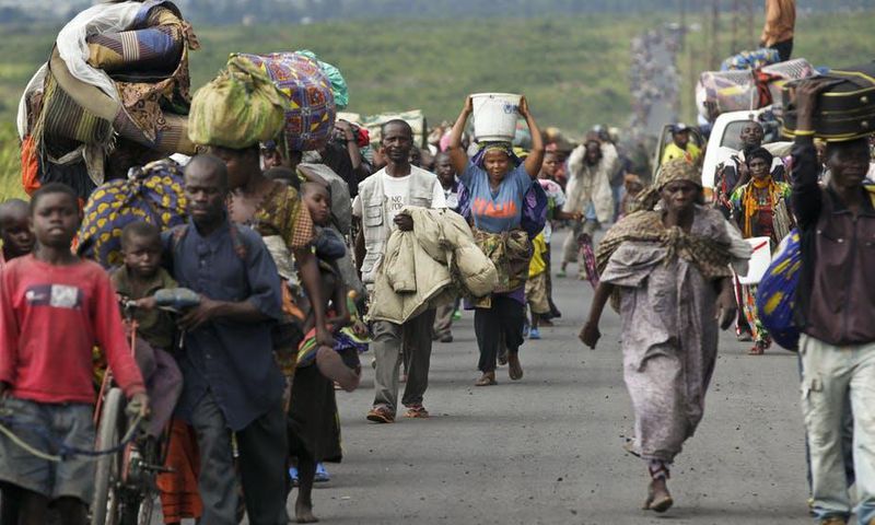 Refugees fleeing the DRC during fighting between rebels and government troops
