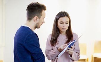 Woman work resume book talk boss employee