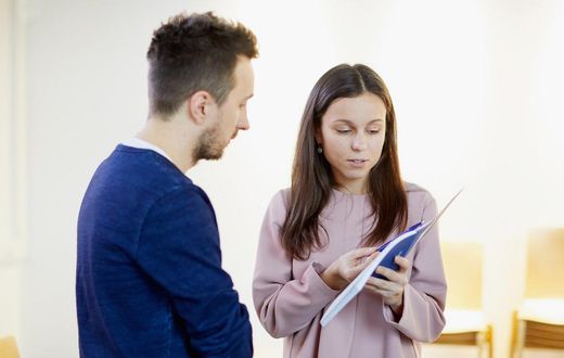 Woman work resume book talk boss employee