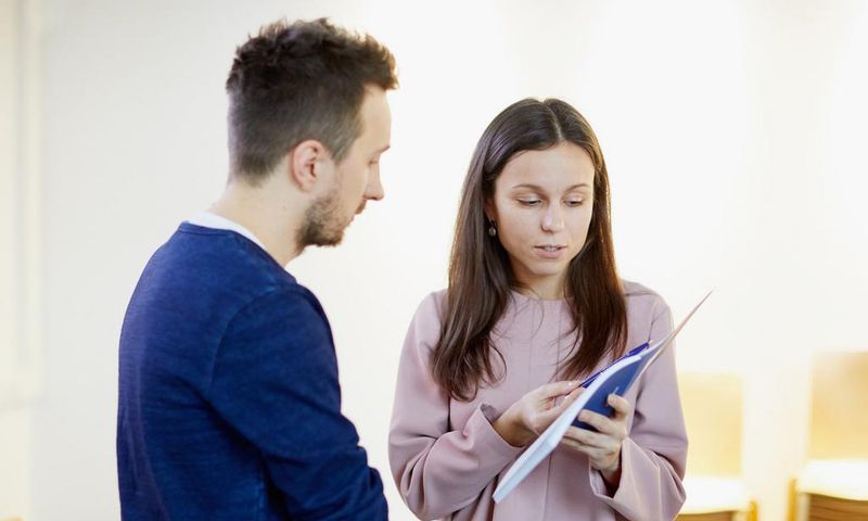 Woman work resume book talk boss employee