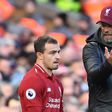 Jurgen Klopp talks to midfielder Xherdan Shaqiri during Liverpool's 4-1 win over Cardiff at Anfield