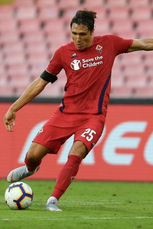 Fiorentina's Italian forward Federico Chiesa celebrated scoring a goal by hugging his brother Lorenzo who was a ball-boy at the stadium.