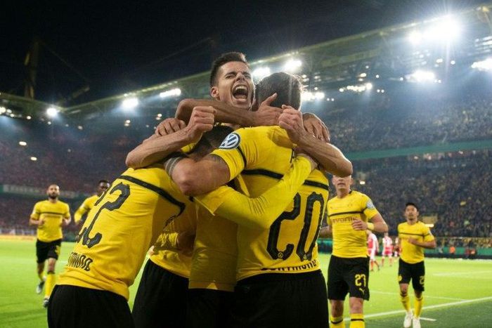 Dortmund forward Maximilian Philipp celebrates scoring the second goal