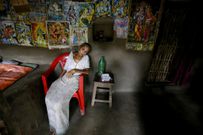 An island in India is disappearing, but some of the last residents say they can't afford to move away