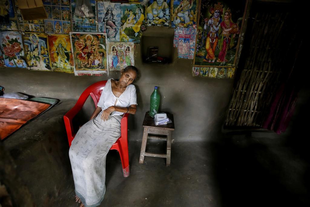 An island in India is disappearing, but some of the last residents say they can't afford to move away