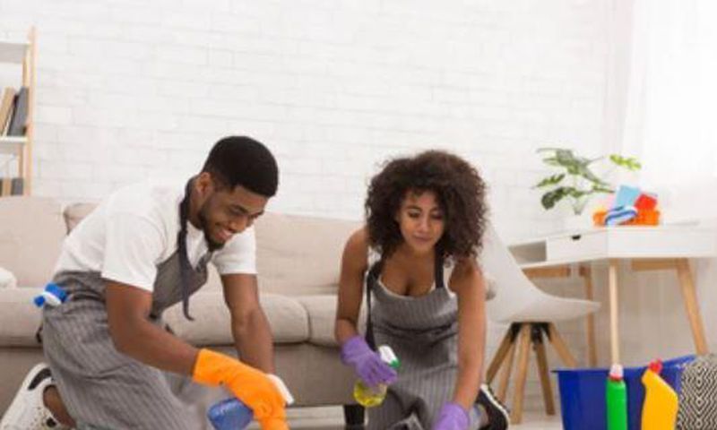 Couple doing house chores together