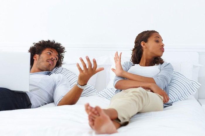 Unhappy couple having an argument.