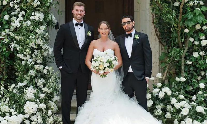 Eminem (right) with Hailie Jade (middle) and her husband, Evan McClintock (left) [Erika Christine Photography]