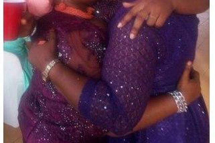 Two women found kissing passionately at a wedding venue